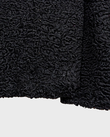 Wrap yourself in elegance with this vintage 80s 90s black real fur coat. This timeless piece adds a touch of luxury to any outfit. 