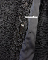 Wrap yourself in elegance with this vintage 80s 90s black real fur coat. This timeless piece adds a touch of luxury to any outfit.