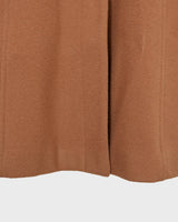 Get ready to slay the Y2k trend with this brown woolmix spring coat! Featuring a luxurious real fur collar, this coat is for everyone who loves to be elegant.