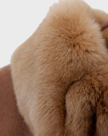 Get ready to slay the Y2k trend with this brown woolmix spring coat! Featuring a luxurious real fur collar, this coat is for everyone who loves to be elegant.
