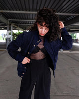 Wrap yourself up in this luxuriously soft, premium HANDCRAFTED Vintage 80s navy blue suede leather jacket (second to last photo shows the signature of the handcrafted work). Please keep in mind, that this jacket has some stains and flaws at the hem and sleeves, which I've already repaired.
