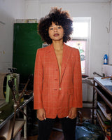 Add a touch of sass to your style with our Preloved salmon color tartan blazer (lightweight blazer - perfect for spring). Made from luxurious silk, virgin wool, and mohair, this blazer is not only stylish but also high-quality. Perfect for XS-S sizes. Upgrade your wardrobe now!