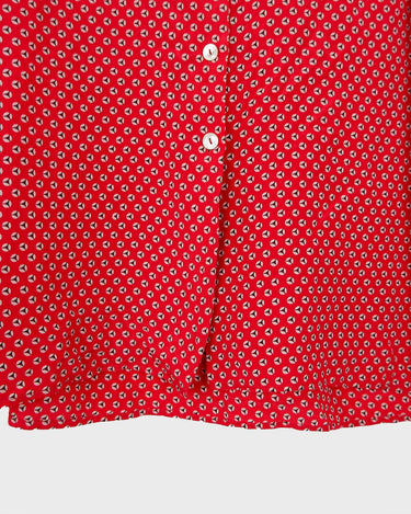 You can never go wrong with a classic! This Vintage 80s / 90s red blouse with the volant collar is as timeless as it gets. Lightweight and smooth, it's the perfect way to spruce up any outfit! Plus, what could be cuter than the unique pattern this blouse features? Get your hands on this timeless piece today!
