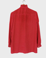 You can never go wrong with a classic! This Vintage 80s / 90s red blouse with the volant collar is as timeless as it gets. Lightweight and smooth, it's the perfect way to spruce up any outfit! Plus, what could be cuter than the unique pattern this blouse features? Get your hands on this timeless piece today!
