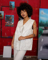 Ready for this 80s 90s vintage white diamond pattern leather vest? The light shimmer adds an an extra sparkle to any outfit.