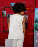 Ready for this 80s 90s vintage white diamond pattern leather vest? The light shimmer adds an an extra sparkle to any outfit.