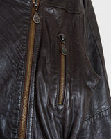 Experience the rustic charm of this vintage 80s chocolate brown leather biker jacket! The buttery-soft leather is sure to make you feel like you’re in the driver’s seat of life. Complete with a belt closure, this jacket is an ideal choice for a stylish and timeless look. Rev up your wardrobe today!