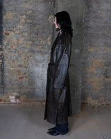Who says vintage can't be wild? This coat is a bold and fierce statement piece! Don't settle for boring fashion - unleash your inner wild side with this unique and stylish leather coat!
