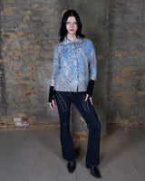 Revive the funky fashion of the 80s with our Vintage 80s 3/4 Sleeve Shirt. In blue with a colorful crazy pattern, it's also knitted with fine, soft fabric for comfort. Available in S-M. Get your groove on!