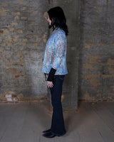 Revive the funky fashion of the 80s with our Vintage 80s 3/4 Sleeve Shirt. In blue with a colorful crazy pattern, it's also knitted with fine, soft fabric for comfort. Available in S-M. Get your groove on!