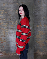 Forget the cold weather blues with this handknitted red vintage unisex sweater - crawl into cozy comforts! Its thick red fabric brings one-of-a-kind style and unmatched warmth! Snug and stylish - what more could you want?