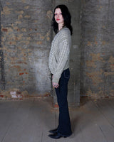 Cable knit sweaters never go out of style - especially when they're as shimmery as this vintage 80 thin sweater! Who doesn't love classic sweater, right?
