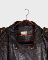Who says vintage can't be wild? This coat is a bold and fierce statement piece! Don't settle for boring fashion - unleash your inner wild side with this unique and stylish leather coat!