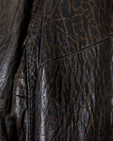 Who says vintage can't be wild? This coat is a bold and fierce statement piece! Don't settle for boring fashion - unleash your inner wild side with this unique and stylish leather coat!