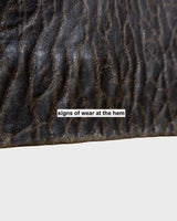 Who says vintage can't be wild? This coat is a bold and fierce statement piece! Don't settle for boring fashion - unleash your inner wild side with this unique and stylish leather coat!
