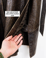Who says vintage can't be wild? This coat is a bold and fierce statement piece! Don't settle for boring fashion - unleash your inner wild side with this unique and stylish leather coat!