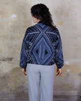 Get a laid back look with this vintage blue sweater from the 80s! Lightweight and perfect for spring, this sweater will add a pop of color to your wardrobe. It's perfect for a relaxed and effortless style.