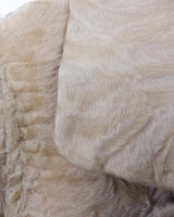 Bring some serious sass to your wardrobe with this fab vintage blazer! Crafted from real fur and showcasing 70s 80s flair, this beige spring blazer is the perfect mix of elegance and playfulness.