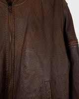 Your outerwear just got serious! Step out in some old-school vibes with this vintage Classic 80s / 90s brown bomber leather jacket.