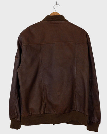 Your outerwear just got serious! Step out in some old-school vibes with this vintage Classic 80s / 90s brown bomber leather jacket.