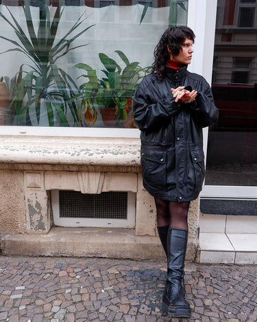 Add some edge to your wardrobe with this must-have preloved Westbury black leather coat. Perfect for cooler weather, this stylish piece will take any outfit to the next level!