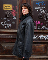 Add some edge to your wardrobe with this must-have preloved Westbury black leather coat. Perfect for cooler weather, this stylish piece will take any outfit to the next level!