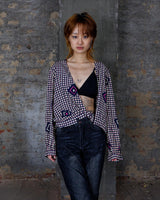 Say goodbye to boring blouses with this vintage 80s geometric masterpiece! Made from a luxurious silk mix, this blouse is a dream come true for those who love playful fashion.