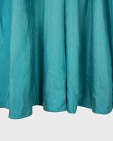 This is love at first sight. You'll fall for this vintage midi silk skirt in dreamy turquoise / light blue shading! Perfectly sized for XS. Please keep in mind that this skirt has some flaws such as rubbed material spot (last photo).