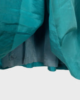 This is love at first sight. You'll fall for this vintage midi silk skirt in dreamy turquoise / light blue shading! Perfectly sized for XS. Please keep in mind that this skirt has some flaws such as rubbed material spot (last photo).