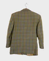 Step into spring with this vintage 80s olive green linen mix blazer, complete with shoulder pads and a grandpastyle washed out tartan/checkered pattern. This blazer is perfect for spring or summer nights with its thin fabric!