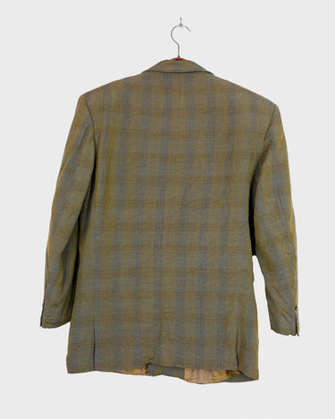 Step into spring with this vintage 80s olive green linen mix blazer, complete with shoulder pads and a grandpastyle washed out tartan/checkered pattern. This blazer is perfect for spring or summer nights with its thin fabric!