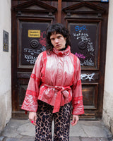 Add a touch of sparkle to your wardrobe with this premium vintage 80s red glitter lamb skin jacket (thin). The belted design offers a flattering fit, while the soft and supple leather provides luxurious comfort!