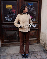 Introducing the y2k beige/cream brown Dino'z leather jacket! Complete with dark golden buttons and light shoulder pads, this jacket is just timeless! 
