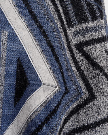 Get a laid back look with this vintage blue sweater from the 80s! Lightweight and perfect for spring, this sweater will add a pop of color to your wardrobe. It's perfect for a relaxed and effortless style.