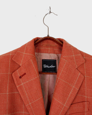 Add a touch of sass to your style with our Preloved salmon color tartan blazer (lightweight blazer - perfect for spring). Made from luxurious silk, virgin wool, and mohair, this blazer is not only stylish but also high-quality. Perfect for XS-S sizes. Upgrade your wardrobe now!