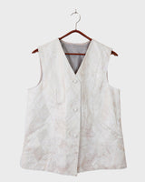 Ready for this 80s 90s vintage white diamond pattern leather vest? The light shimmer adds an an extra sparkle to any outfit.