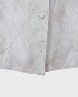 Ready for this 80s 90s vintage white diamond pattern leather vest? The light shimmer adds an an extra sparkle to any outfit.