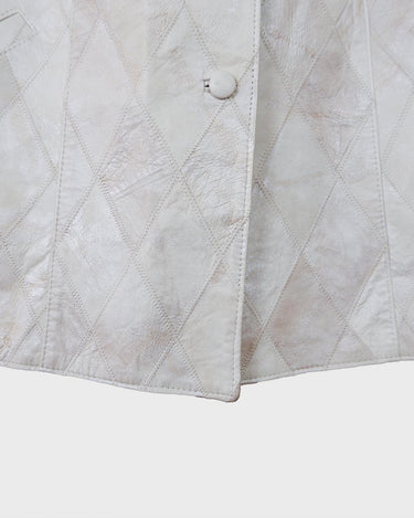 Ready for this 80s 90s vintage white diamond pattern leather vest? The light shimmer adds an an extra sparkle to any outfit.