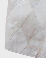 Ready for this 80s 90s vintage white diamond pattern leather vest? The light shimmer adds an an extra sparkle to any outfit.