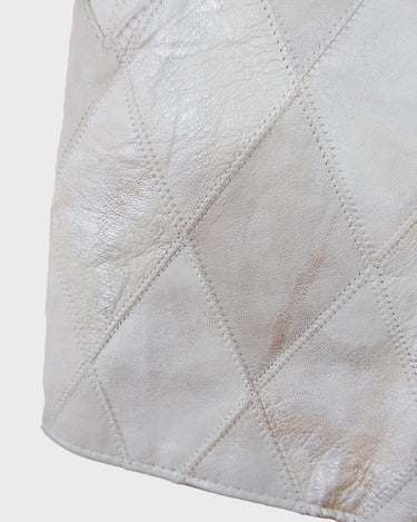 Ready for this 80s 90s vintage white diamond pattern leather vest? The light shimmer adds an an extra sparkle to any outfit.