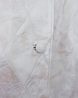 Ready for this 80s 90s vintage white diamond pattern leather vest? The light shimmer adds an an extra sparkle to any outfit.