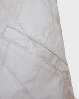 Ready for this 80s 90s vintage white diamond pattern leather vest? The light shimmer adds an an extra sparkle to any outfit.