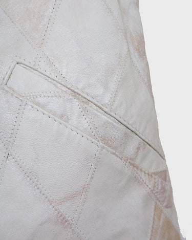 Ready for this 80s 90s vintage white diamond pattern leather vest? The light shimmer adds an an extra sparkle to any outfit.
