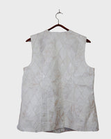 Ready for this 80s 90s vintage white diamond pattern leather vest? The light shimmer adds an an extra sparkle to any outfit.