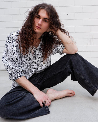It's shimmery, it's polka-dotted, and it's totally 80s! Add a little pizzaz to your wardrobe with this classic 80s vintage blouse.
