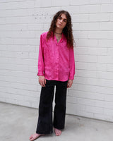 This pink blouse will have you feelin' those '80s vibes! Enjoy all that extra sparkle with this glitzy long sleeve look!