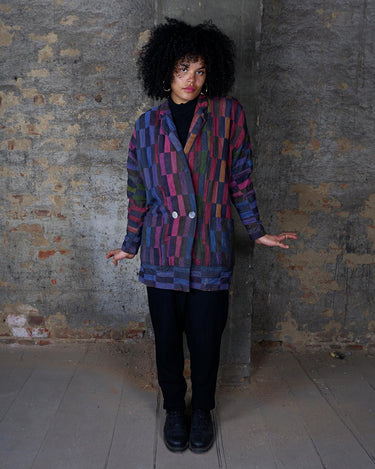 Introducing our PREMIUM vintage 80s cotton blazer made with bold, colorful block stripes! Handmade for a unique style, this blazer is perfect for standing out in the crowd. Show off your playful side with this thick and vibrant statement piece.