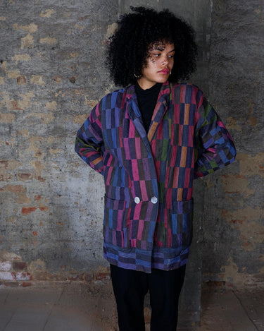 Introducing our PREMIUM vintage 80s cotton blazer made with bold, colorful block stripes! Handmade for a unique style, this blazer is perfect for standing out in the crowd. Show off your playful side with this thick and vibrant statement piece.