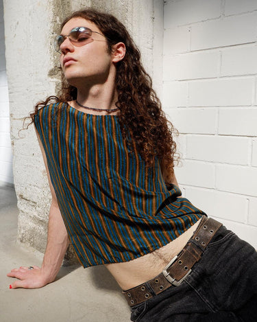 Vibe on all those 90s vibes with this one-of-a-kind vintage viscose top! Striped and with waving details, you can flaunt your style in this timeless piece. Just don't forget to bring the sunnies!