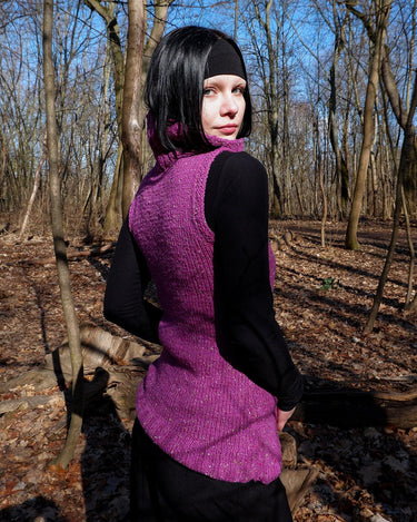 Introducing this handmade purple long turtlekneck slipover! The colorful melange design adds a playful twist to this cozy XS-S fit, perfect for layering.